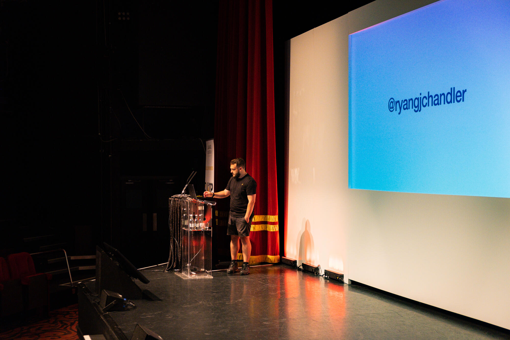 A photo of me on stage at Laravel Live UK 2023.